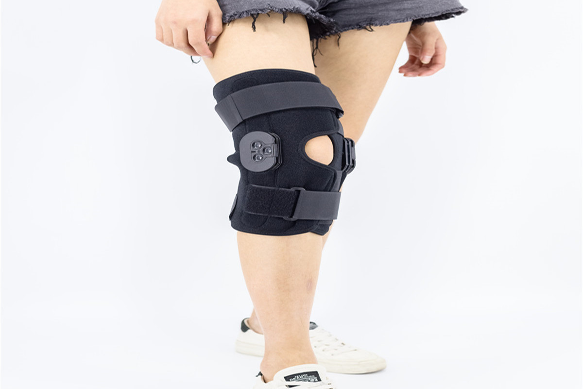 ACL αρθρωτό γόνατο Wraparound OK ύφασμα Laminated Αναπνεύσιμο Νεοπρένιο Επένδυση με ανοιχτό Patellar
