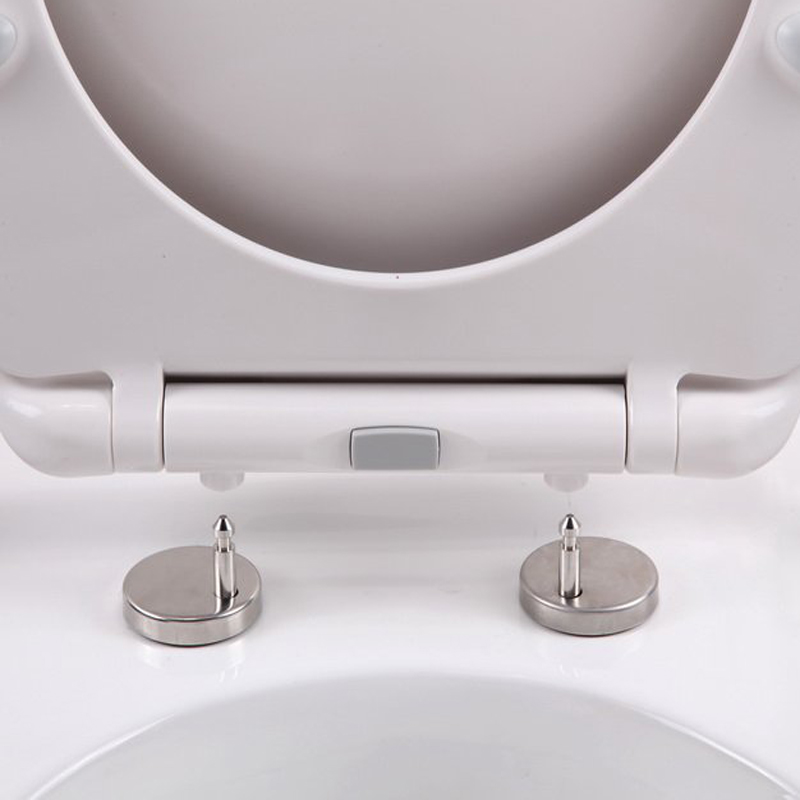 Αργή στενή κάθισμα τουαλέτας μεντεσέδες ένα κουμπί κλικ